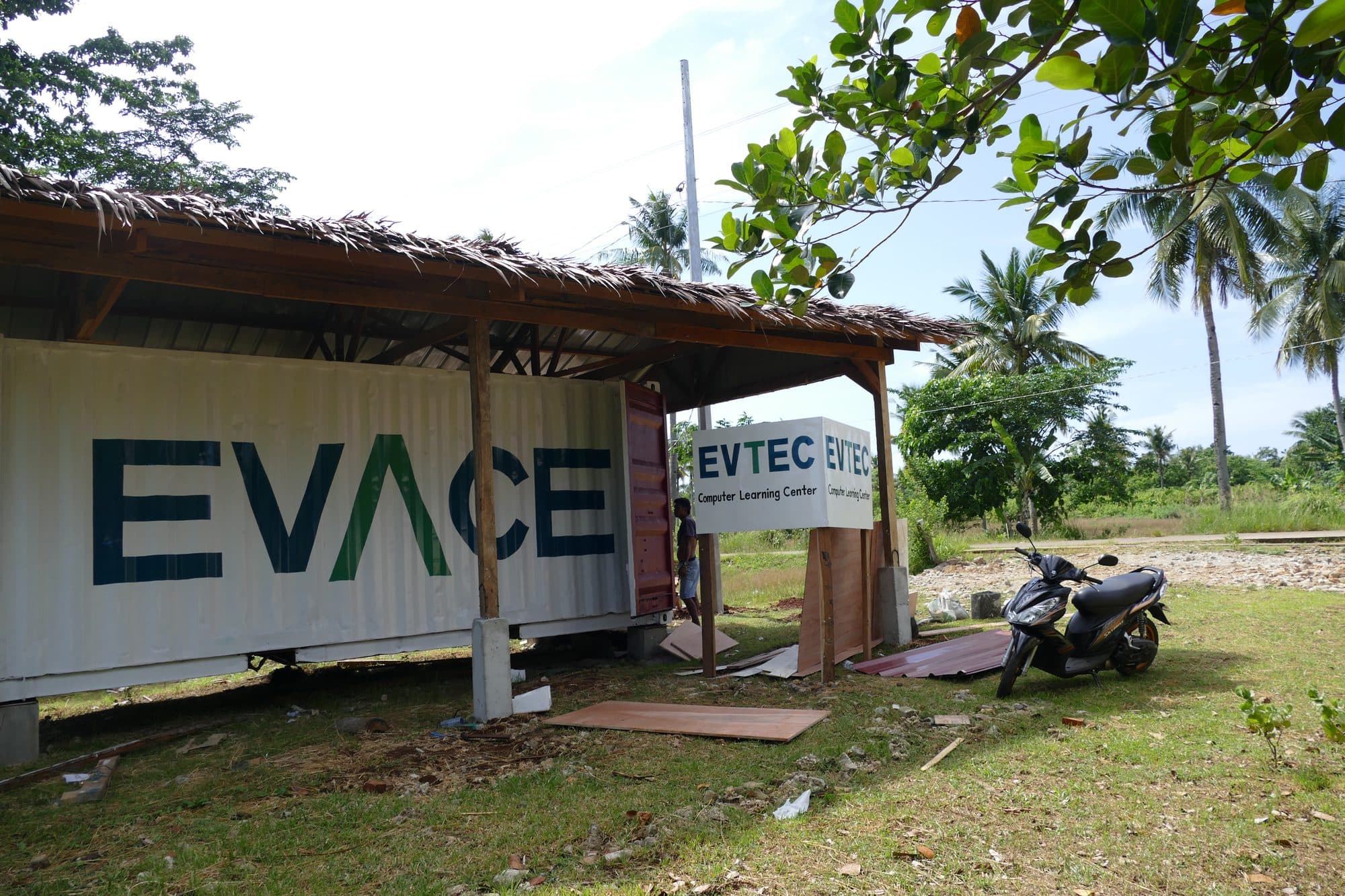 The container classroom with the EVACE name on its side