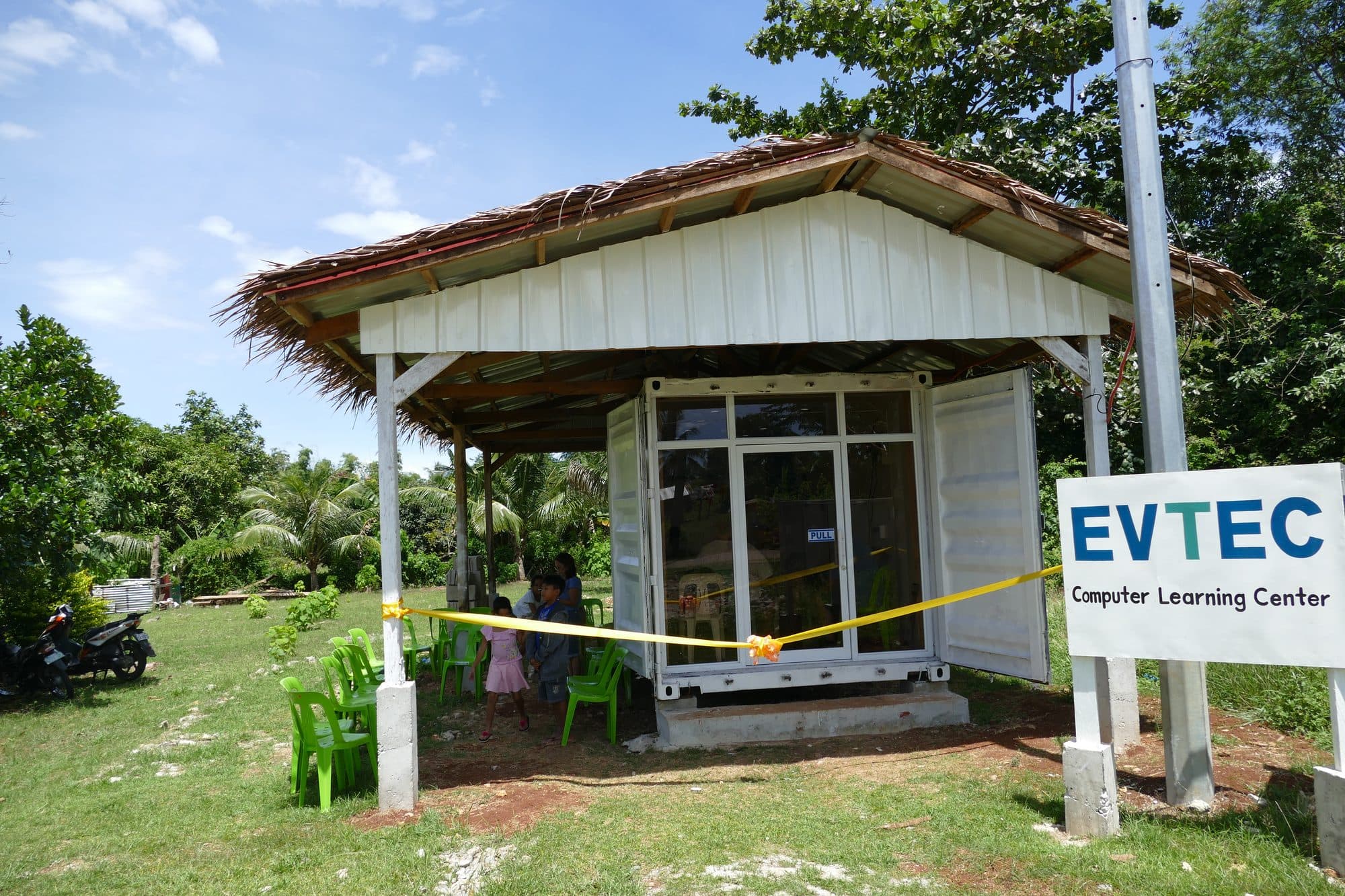The finished learning center with a yellow ribbon tied across the front